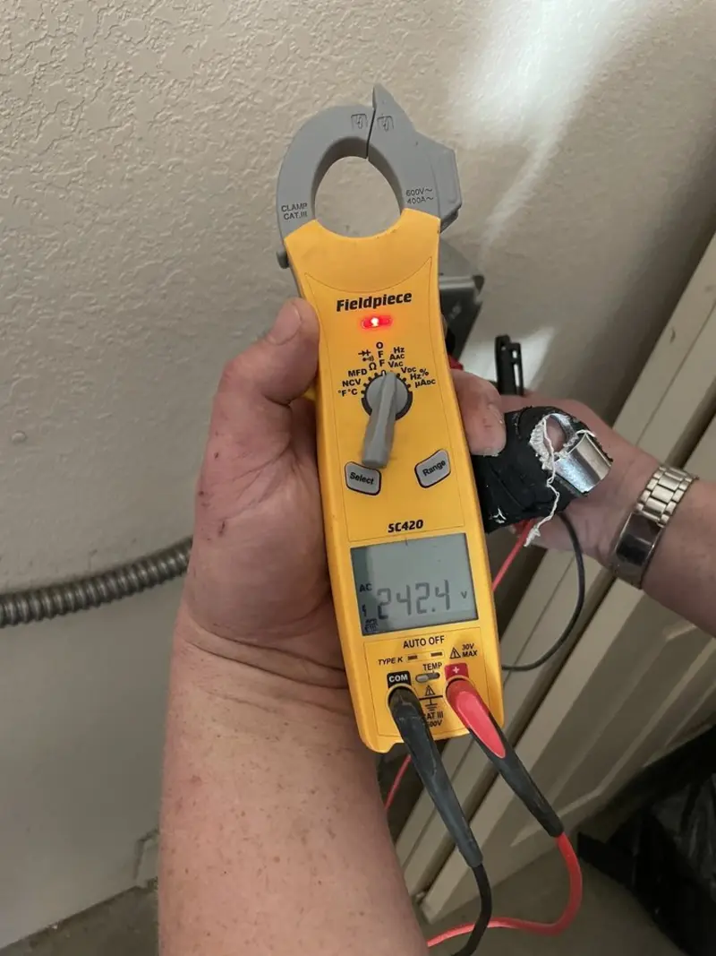 Voltage testing with clamp meter during Aluminum Wiring Replacement in Clairton